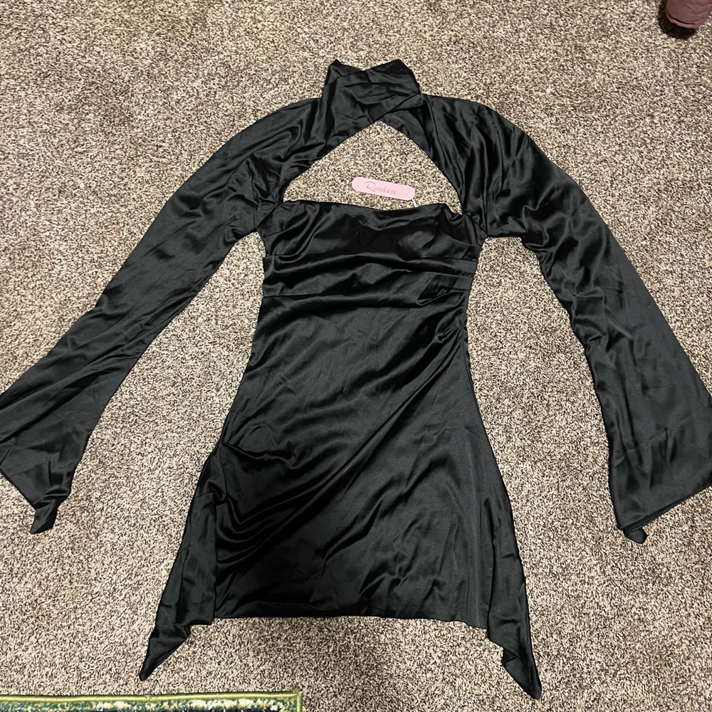 Rosedress black long sleeve dress. Brand new never worn. Can fit s/m